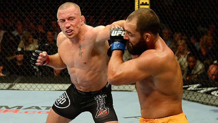 St-Pierre defeats Hendricks, but not without controversy