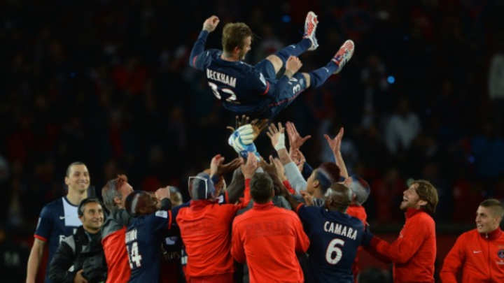 Tearful David Beckham embraced by teammates, walks off field for last time