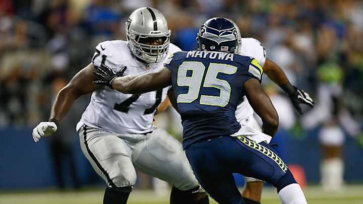 Raiders tap rookie Menelik Watson to start at left tackle