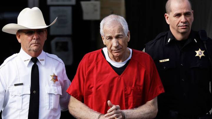 Penn State's board authorizes Sandusky settlements