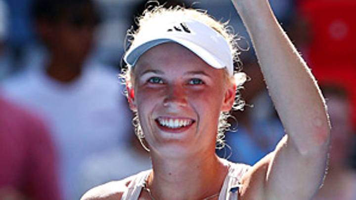 Wozniacki braves 106-degree match to move on Wozniacki braves 106-degree match to move on