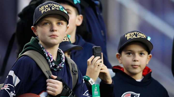 Patriots host Newtown police officers at game