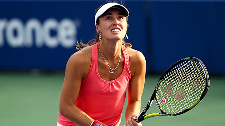 Hingis questioned after being accused of assault by estranged husband