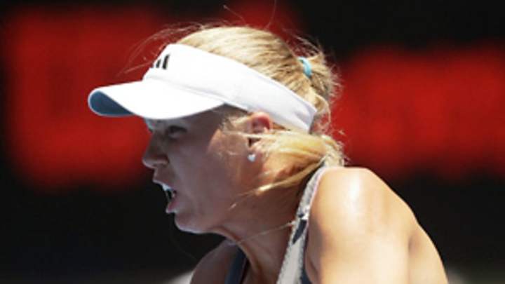Wozniacki rolls, Kvitova upset in Sydney openers Wozniacki rolls, Kvitova upset in Sydney openers