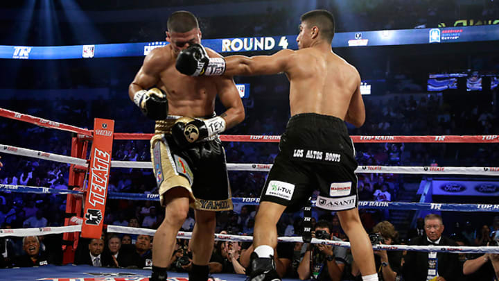 Mikey Garcia tops Juan Manuel Lopez, leaving WBO belt vacant