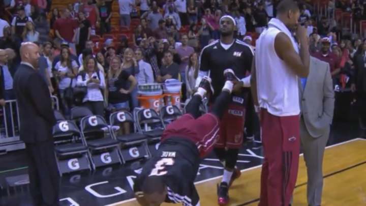 LeBron James, Dwyane Wade pull off wheelbarrow videobomb of Chris Bosh interview