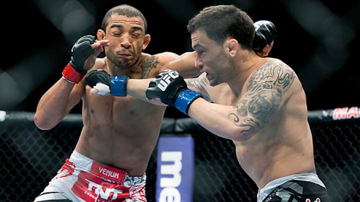 Aldo stops Edgar, keeps featherweight title