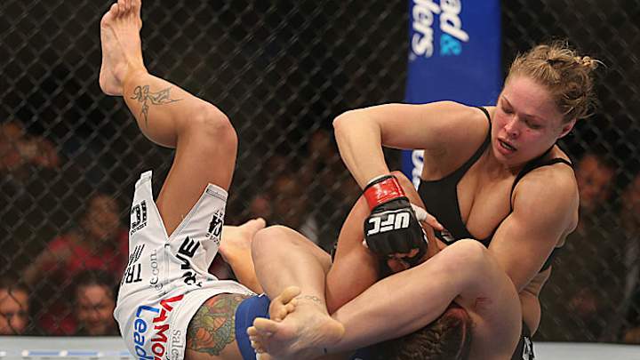 Rousey wins in victory for women's MMA fighting Rousey wins in victory for women's MMA fighting