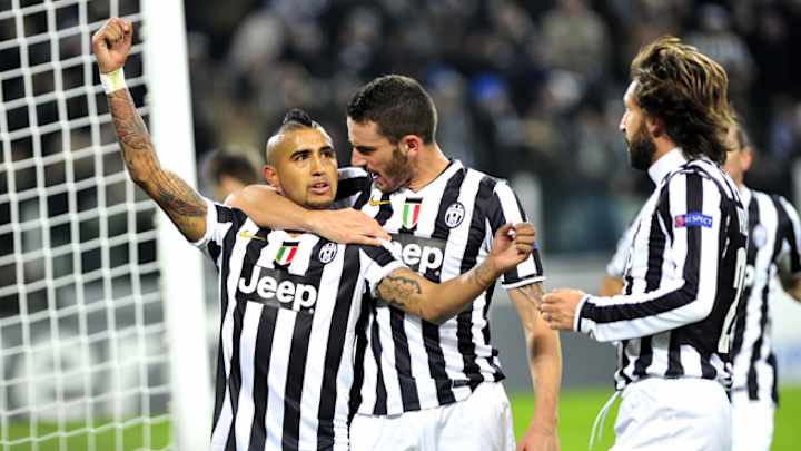 Vidal hat trick lifts Juventus to 2nd in Champions League group
