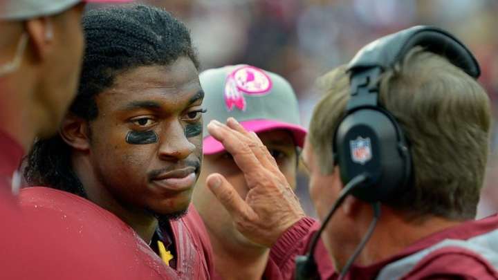 Judge tells NFL, retired players in concussions case to negotiate