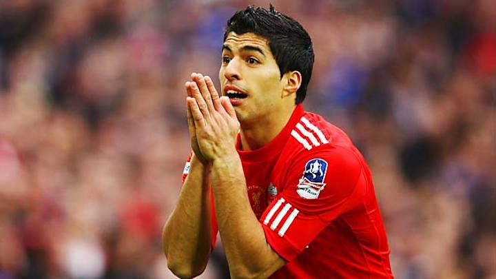 Liverpool fines Luis Suarez for biting opponent