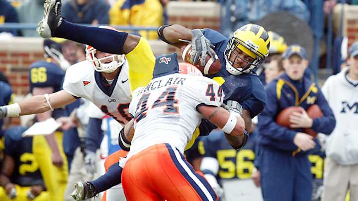 Illinois football staff member faces gun charge