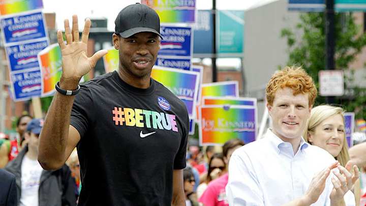 Jason Collins marches in Boston gay pride parade