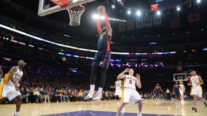 Andre Drummond connects on a pass from Brandon Jennings for spectacular dunk