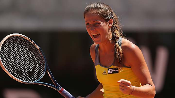 Wozniacki upset in first round; Djokovic, Federer cruise at Italian Open