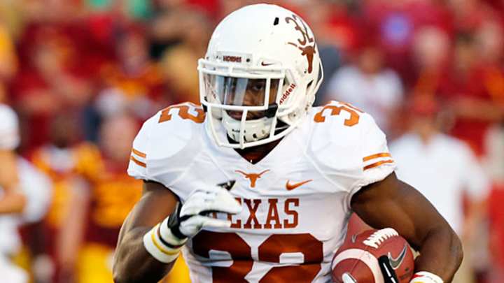 Texas running back Johnathan Gray taken to locker room with leg injury Texas running back Johnathan Gray taken to locker room with leg injury