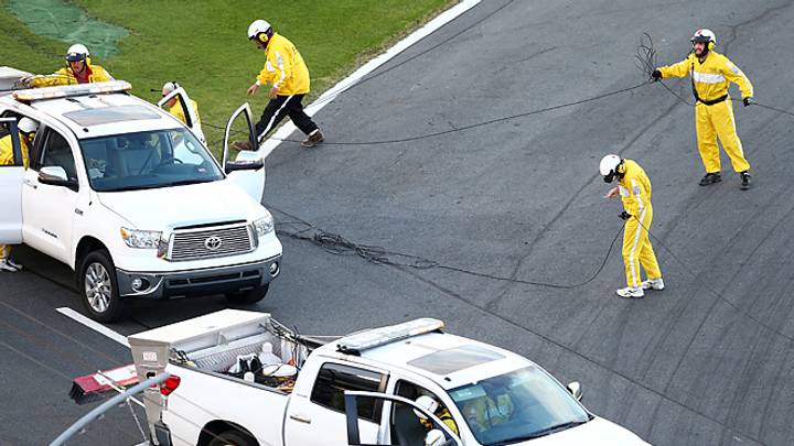 Fallen TV cable injures fans, delays Charlotte race Fallen TV cable injures fans, delays Charlotte race