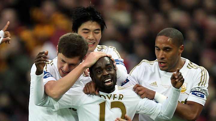 Swansea makes club history in dominant League Cup final