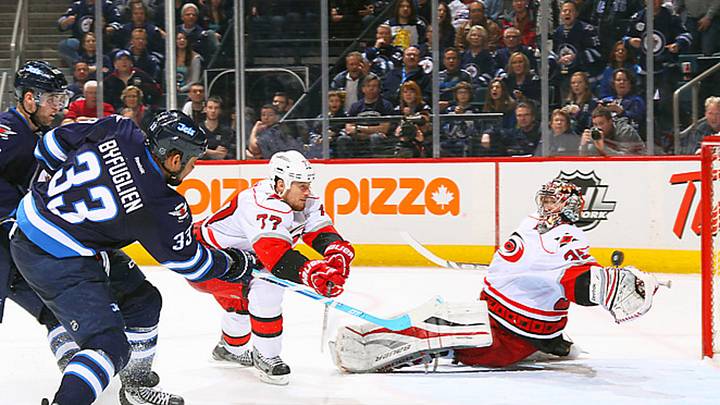 Jets get huge OT win over 'Canes to keep pace in playoff hunt Jets get huge OT win over 'Canes to keep pace in playoff hunt