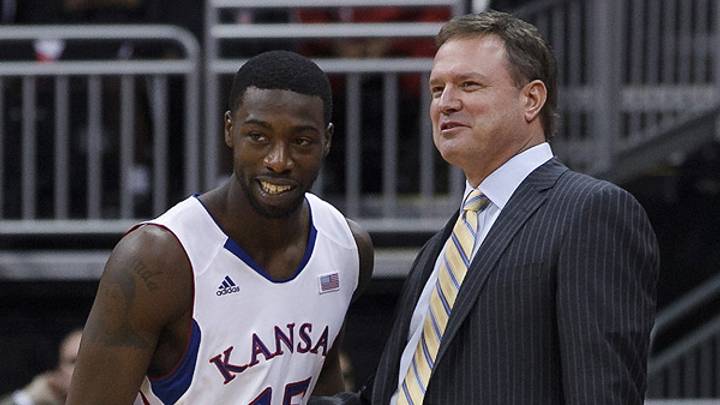 Bill Self takes playful shot at Elijah Johnson at team banquet (Video)