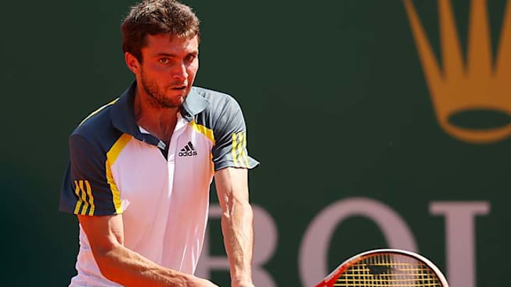 Gilles Simon wins, Janko Tipsarevic upset in Bucharest