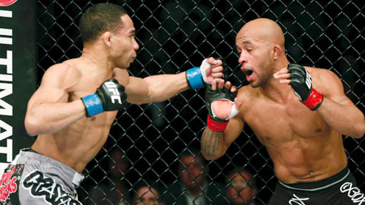 Johnson shows championship mettle, retains UFC title