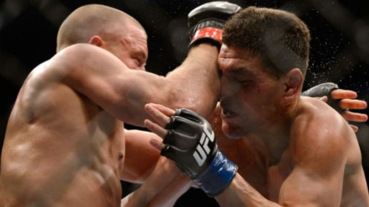 Georges St-Pierre delivers beating to Nick Diaz at UFC 158