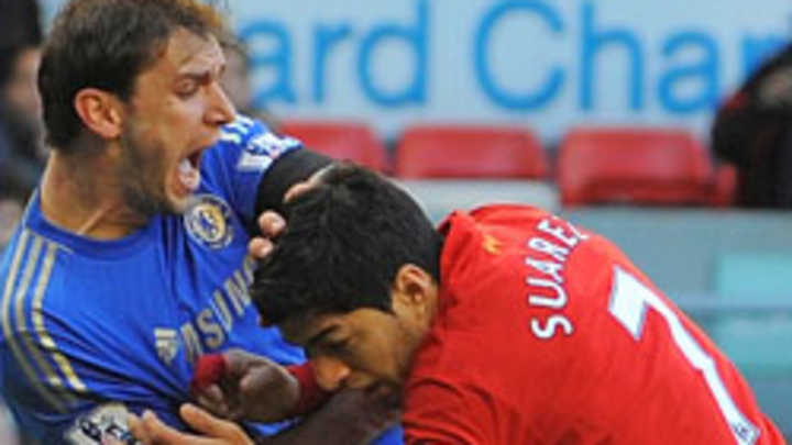 Liverpool striker Luis Suarez suspended 10 games for biting opponent