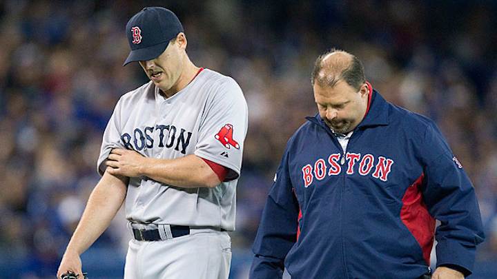 John Lackey exits start after injuring arm