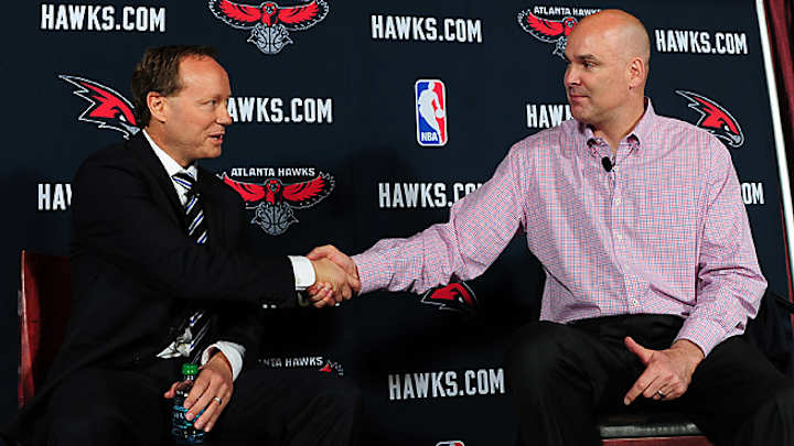 Danny Ferry standing by Mike Budenholzer as Hawks open camp