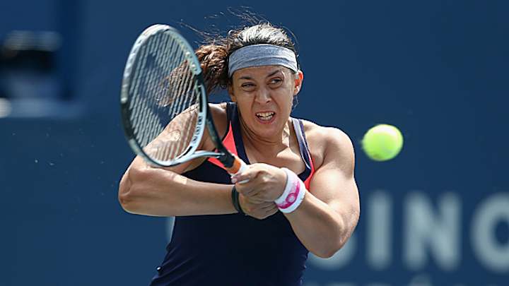 Bartoli retires from Rogers Cup with an abdominal injury