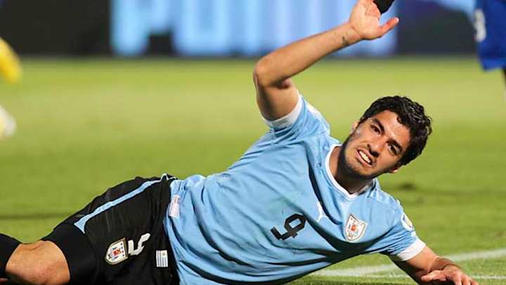 FIFA probes Luis Suarez for allegedly punching Chile's Jara