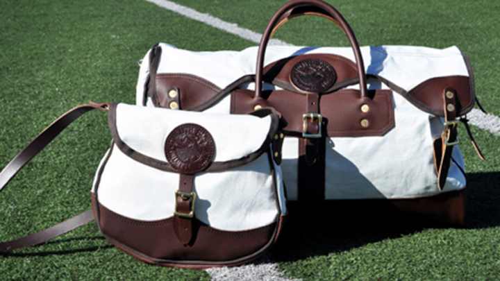 Need a new purse or travel bag? Why not get one one made from the Metrodome roof?