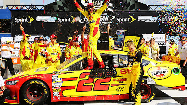 Joey Logano holds off Kevin Harvick for crucial Michigan 400 win
