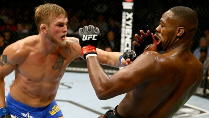 Despite unexpected challenge, Jon Jones hangs on to title belt