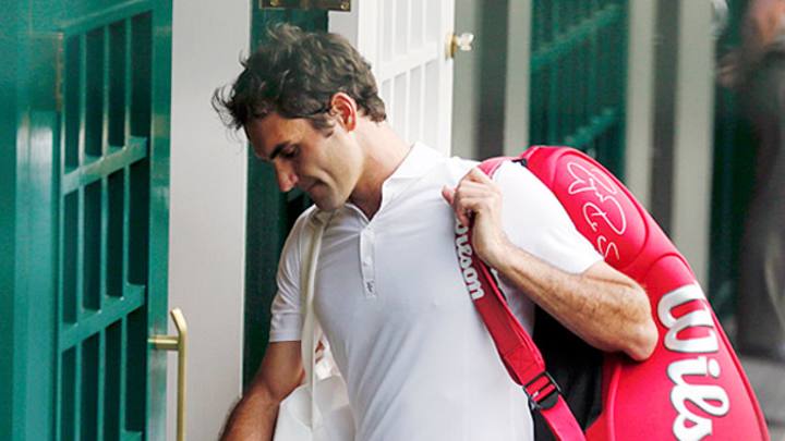 Sergiy Stakhovsky shocks Roger Federer in second round of Wimbledon Sergiy Stakhovsky shocks Roger Federer in second round of Wimbledon