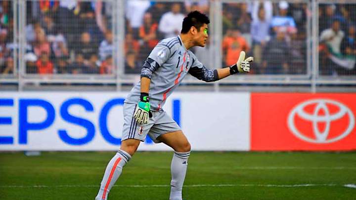 Dazzled Japan irked by laser beams in shock loss to Jordan