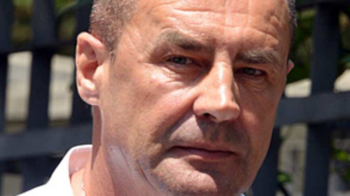 John Tomic breaks down in hearing for alleged assault of son's hitting partner