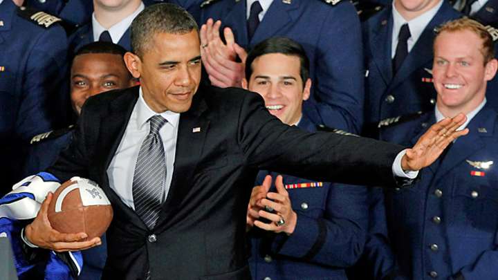 Obama not sure he'd allow a son to play football