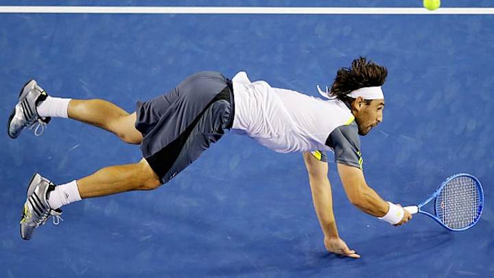 Mikhail Youzhny, Marcos Baghdatis advance at Zagreb Indoors