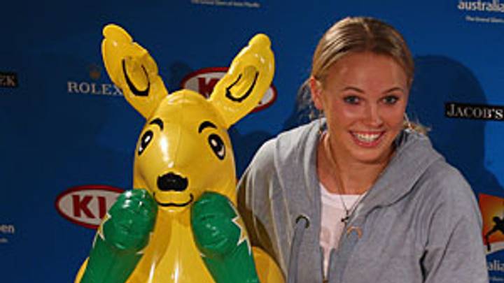 Wozniacki's act extended with Schiavone win Wozniacki's act extended with Schiavone win