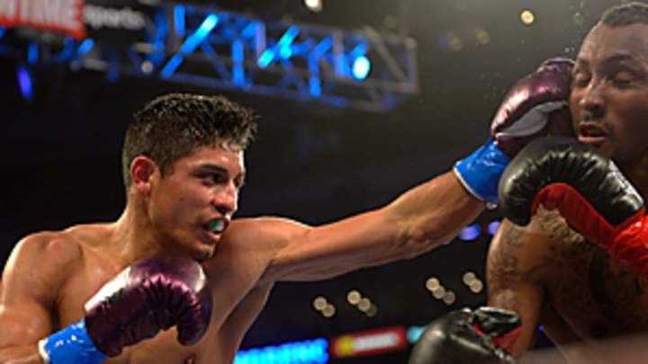 Mares beats Moreno, defends 122-pound title