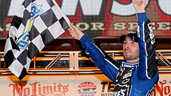 Johnson holds on at Texas