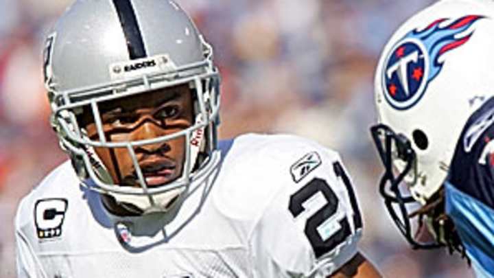 Asomugha decides against holdout, to sign one-year deal with Raiders