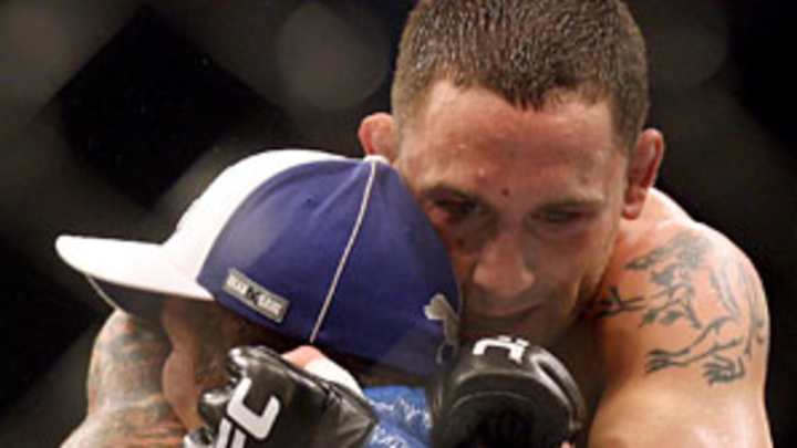 Edgar settles into life of UFC champ, Penn's book makes waves