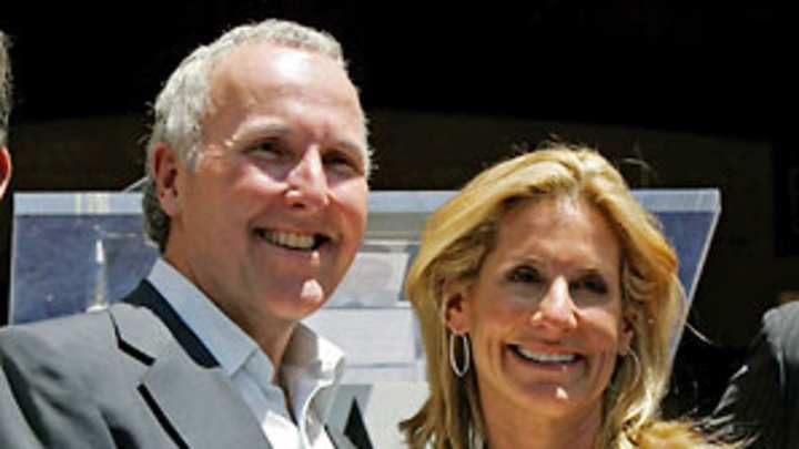 Dodgers' Frank McCourt fires wife as CEO as couple seeks divorce
