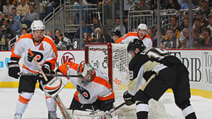 The mystery man in the Flyers' net, staged fight madness, more