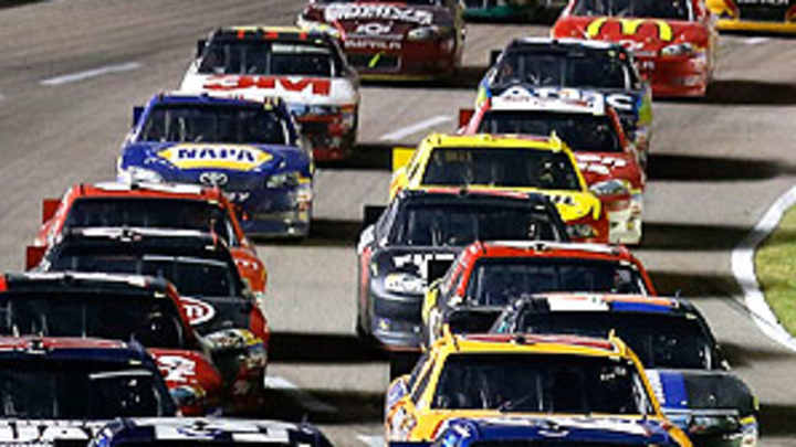 Johnson holds off Keselowski in turbulent finish at Texas