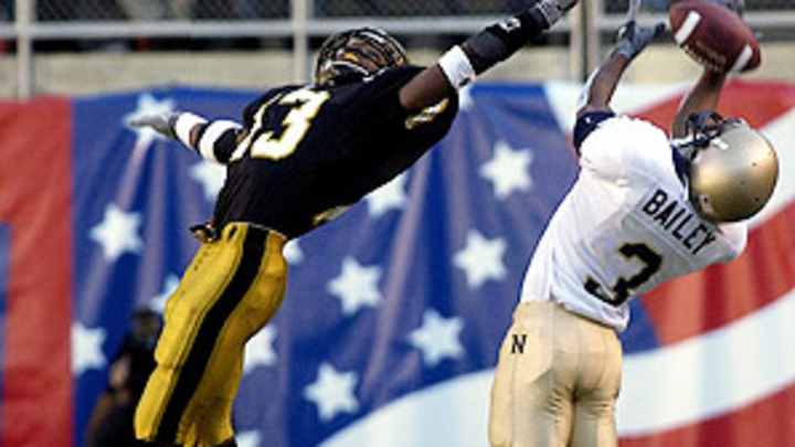 '01 Army-Navy game players carry lessons from gridiron to battlefield