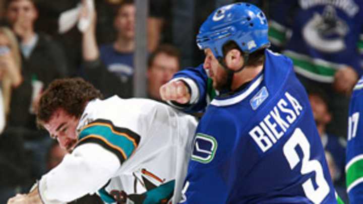 Bieksa pulls off the rarest of hat tricks as Canucks hammer Sharks